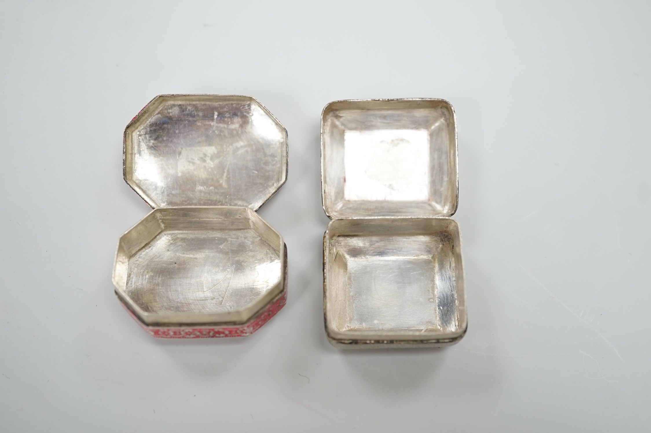 Two early 20th century? Persian white metal and enamelled pill boxes, including octagonal, 35mm.
